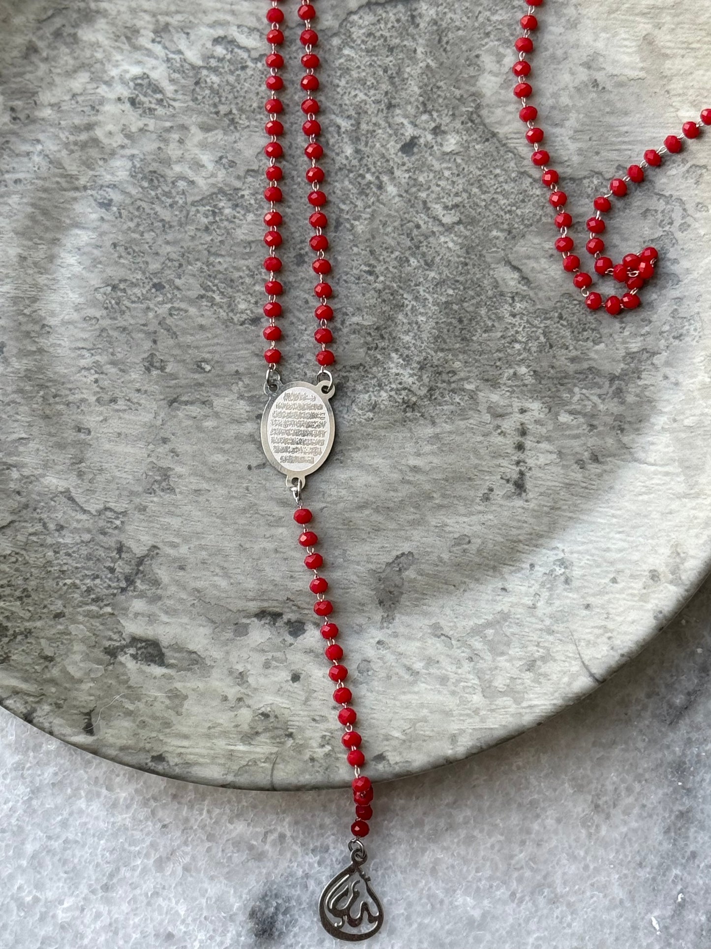 Close-up of Ayat Al-Kursi pendant on red beaded necklace, handmade Islamic jewelry for women- Suzys Treasures