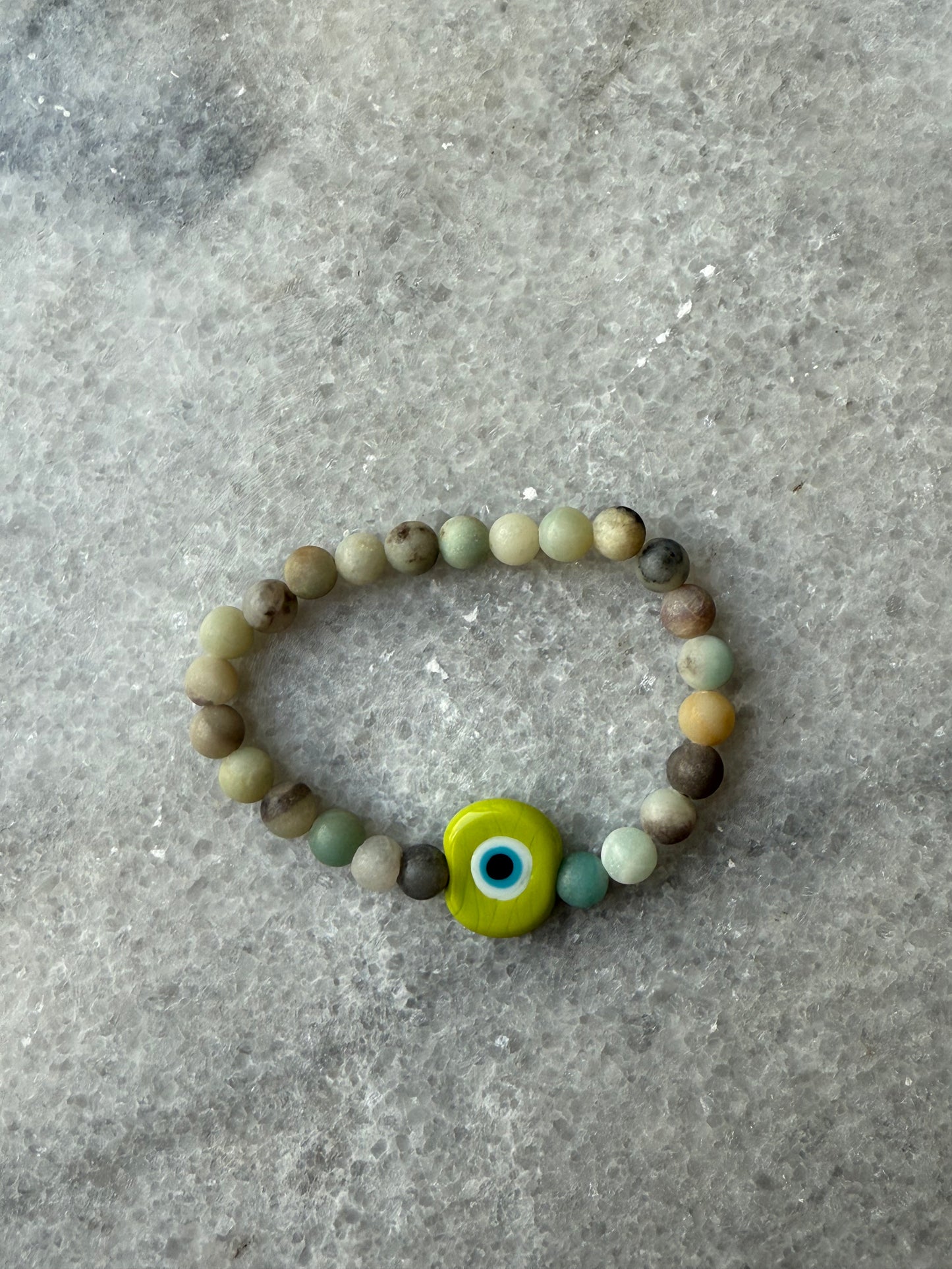 crystal bead evil eye bracelets with Murano-style glass charms in green, handmade jewelry by Suzys Treasures
