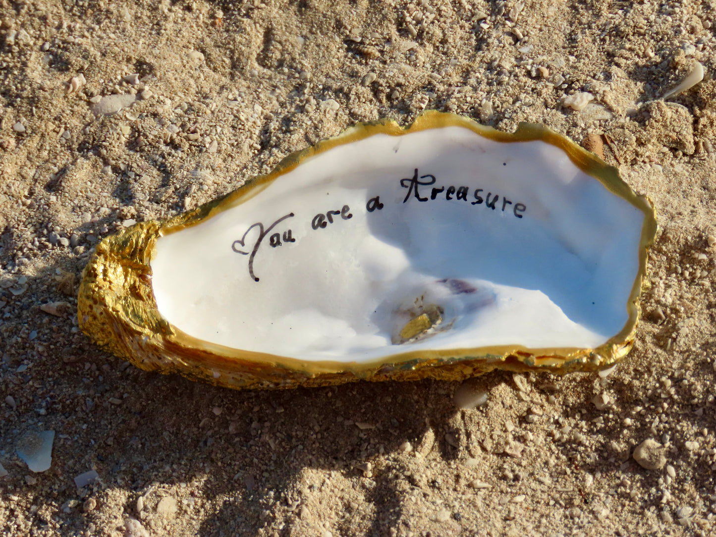 Handcrafted golden-edged oyster shell with “You Are a Treasure” message – Suzy Treasures ocean-inspired keepsake gift