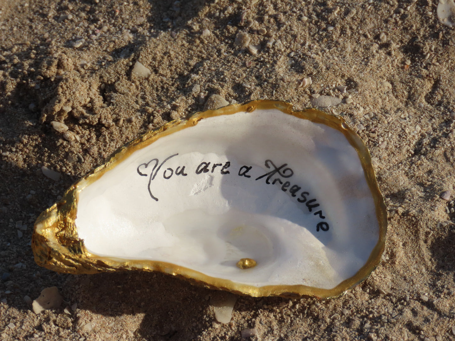 Handcrafted golden-edged oyster shell with “You Are a Treasure” message – Suzy Treasures ocean-inspired keepsake gift