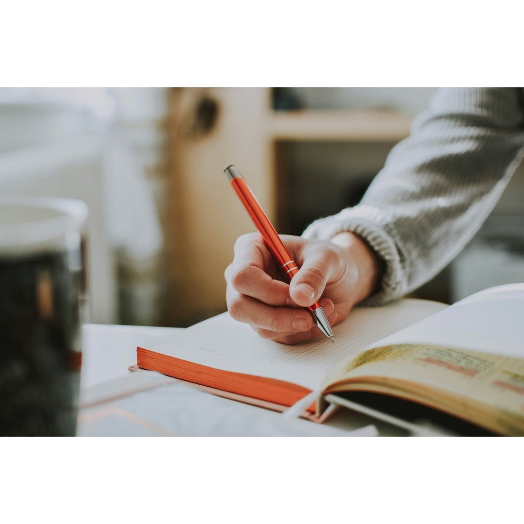 Woman practicing gratitude journaling for beginners with a mindfulness approach