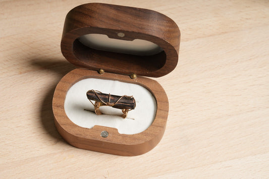 Raw Black Tourmaline gold-plated ring displayed in a wooden ring box – Suzy's Treasures