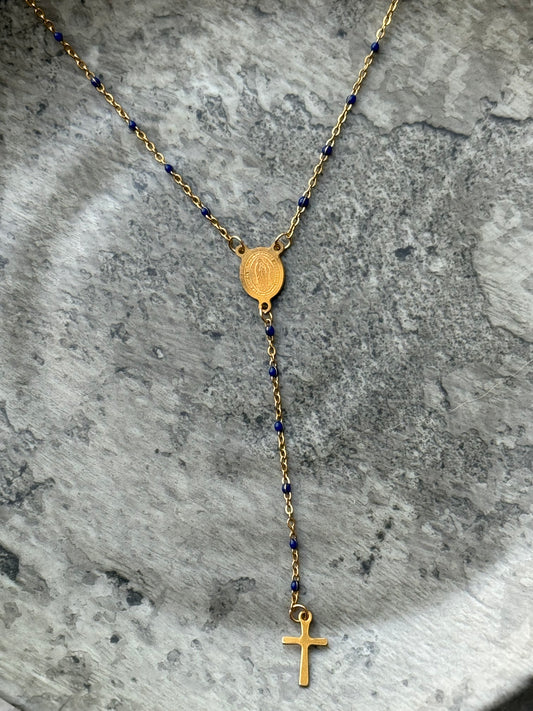 Close-up of lapis lazuli and gold cross pendant with Virgin Guadalupe, elegant faith-based jewelry for women by Suzys Treasures.