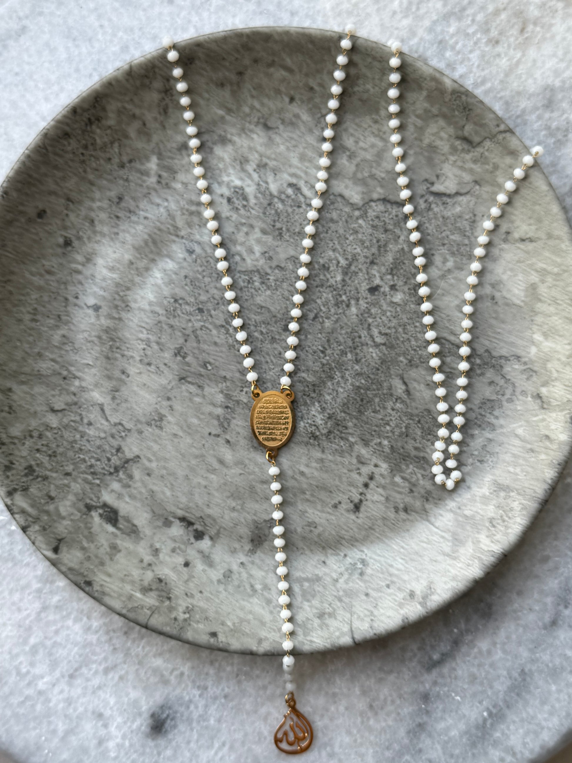 Long white Ayat Al-Kursi necklace with elegant beaded design and Quranic verse pendant from Suzys Treasures