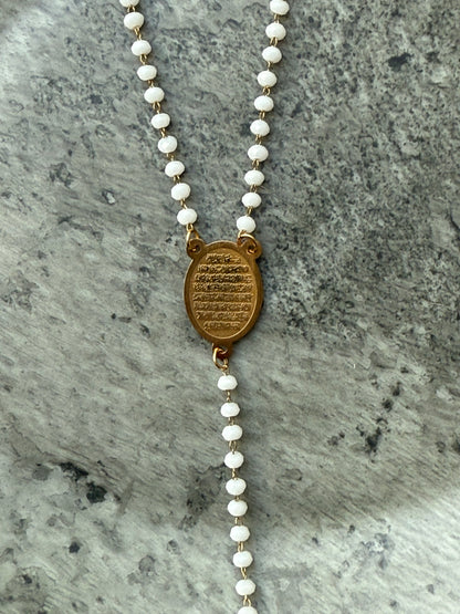 Close-up of Ayat Al-Kursi pendant on white beaded necklace, handmade Islamic jewelry for women