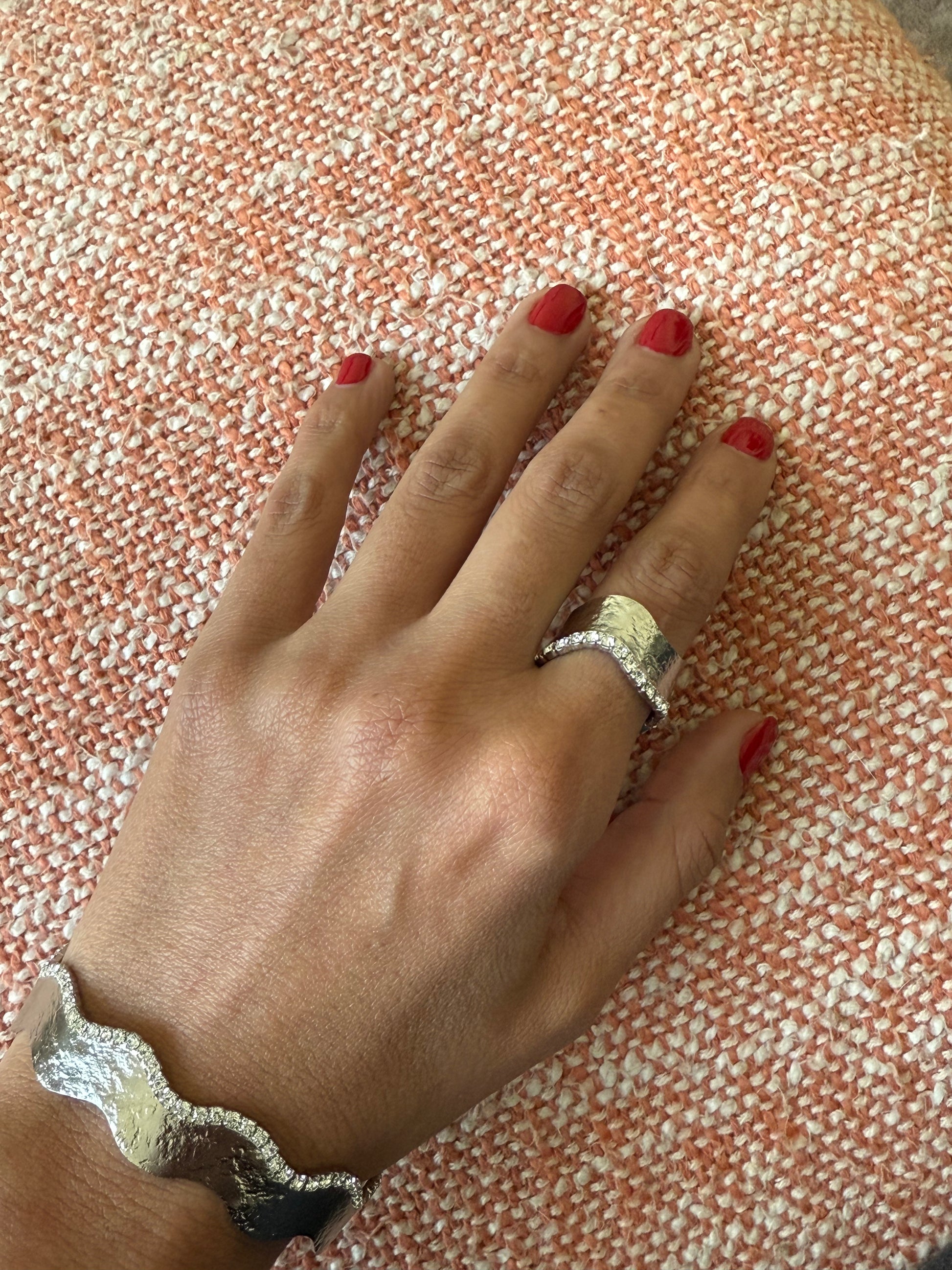 Model hand wearing handcrafted rhodium-plated silver bangle and ring set with zircon stones, elegant artisan jewelry - Suzys Treasures