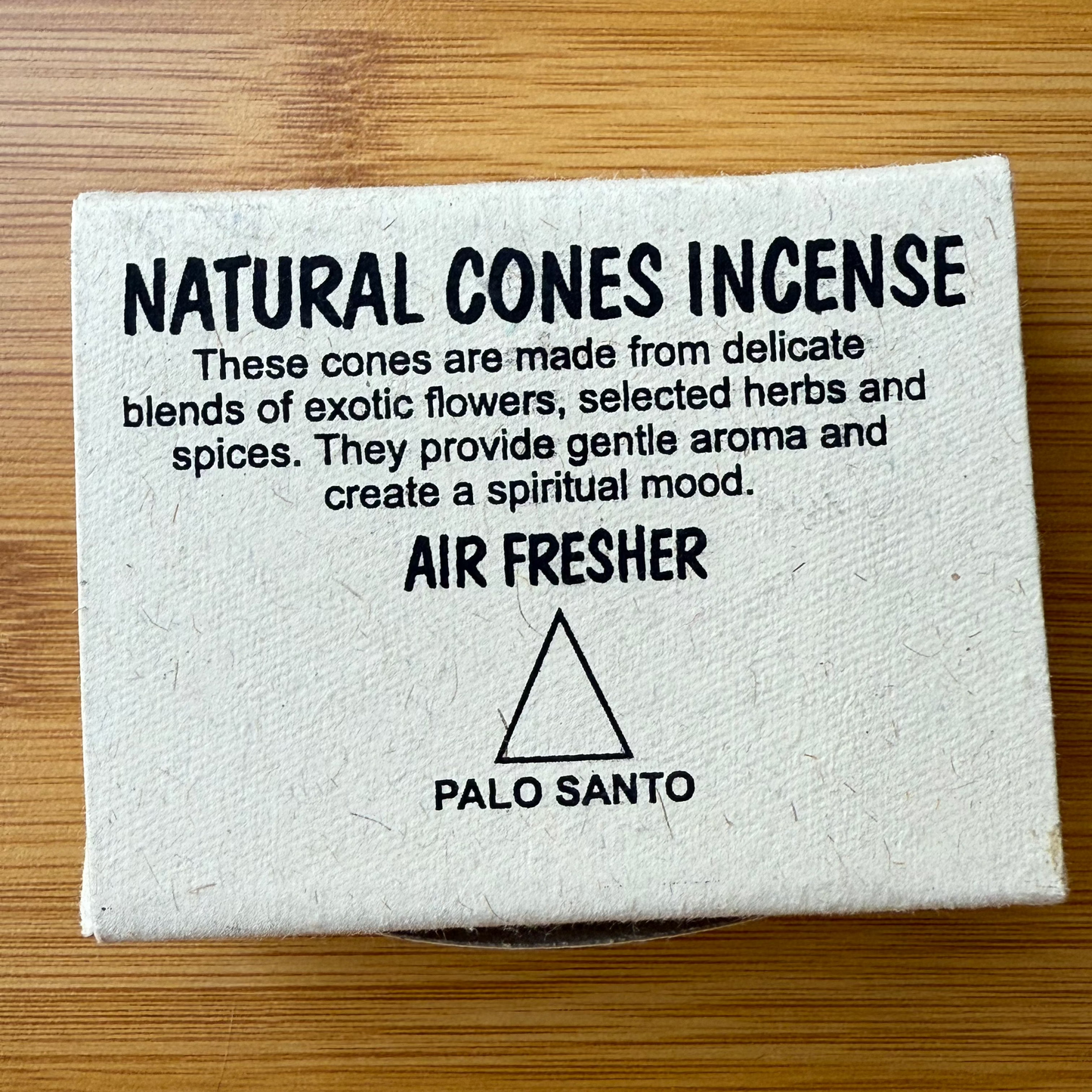 Palo Santo incense cones made from sacred wood and herbs, packaged in a natural box, perfect for energy cleansing, from Suzys Treasures.

