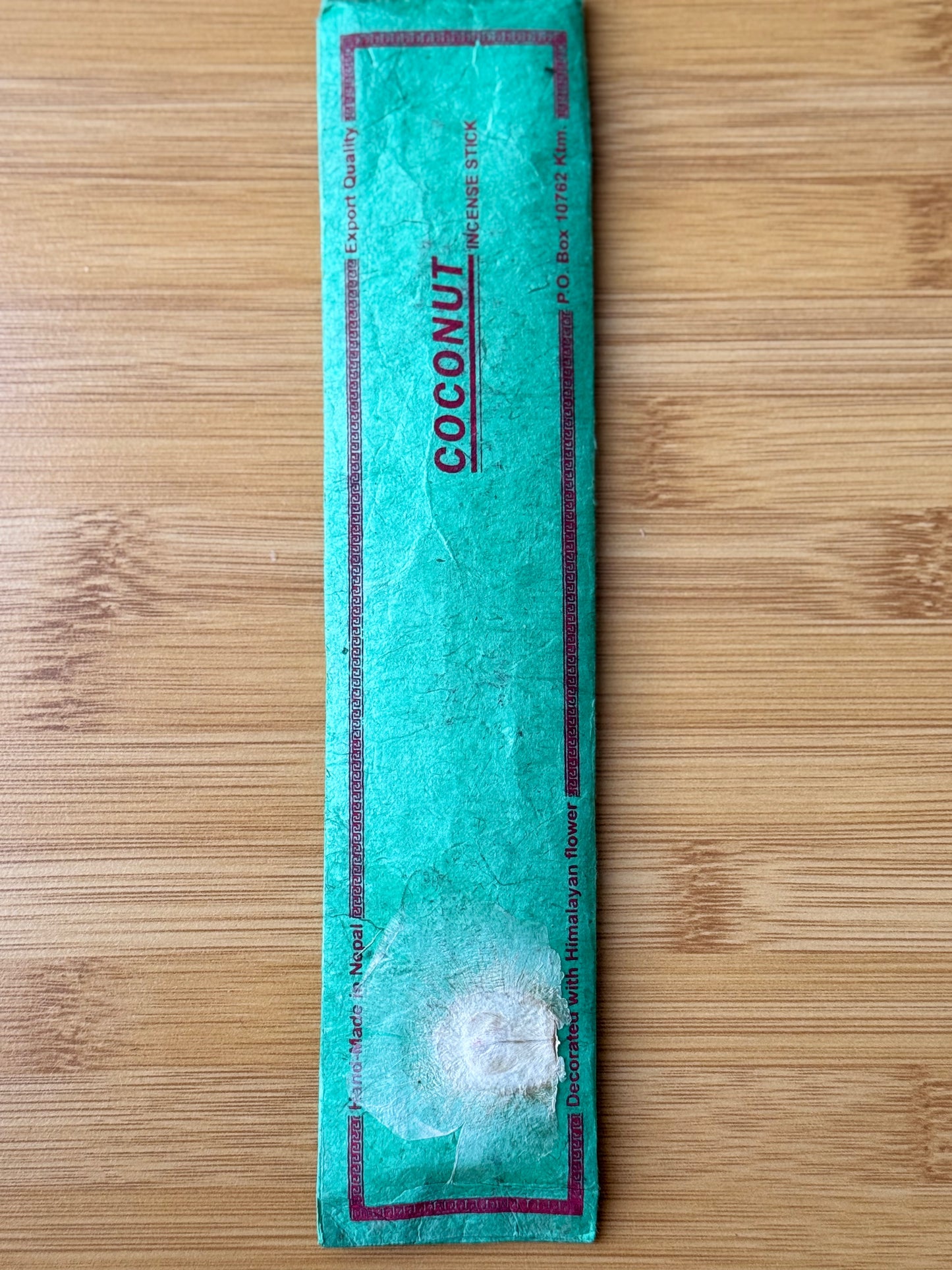 Handmade incense stick pack in Coconut, wrapped in eco-friendly lokta paper, 100% natural and made in Nepal, part of the Sacred Scents & Space collection by Suzy’s Treasures.