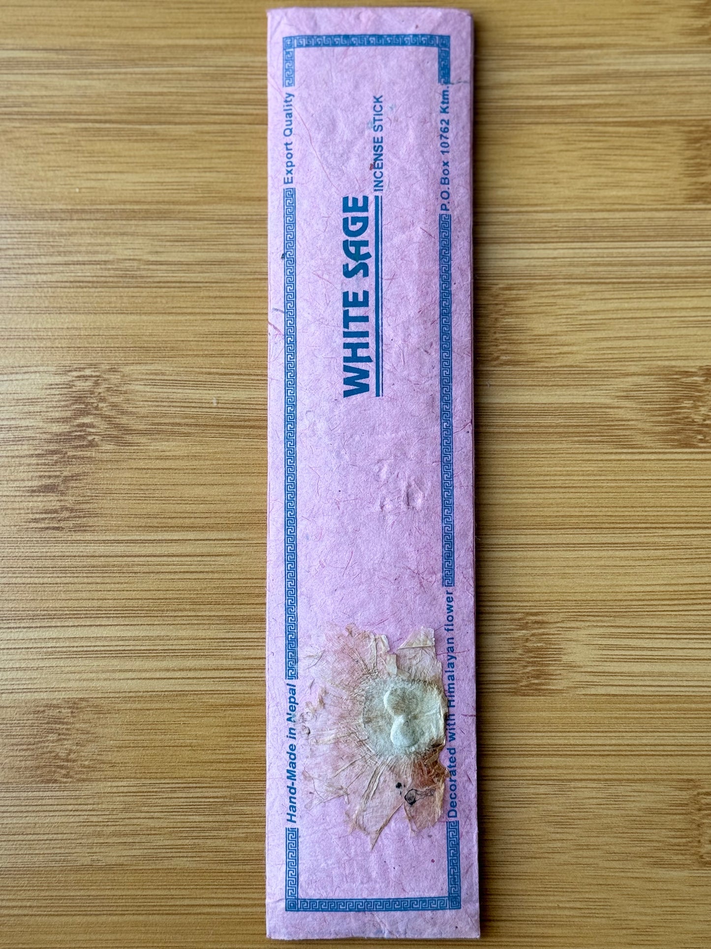 Handmade incense stick pack in White Sage, wrapped in eco-friendly lokta paper, 100% natural and made in Nepal, part of the Sacred Scents & Space collection by Suzy’s Treasures.