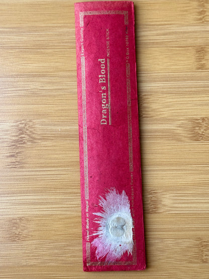 Handmade incense stick pack in Dragons Blood, wrapped in eco-friendly lokta paper, 100% natural and made in Nepal, part of the Sacred Scents & Space collection by Suzy’s Treasures.