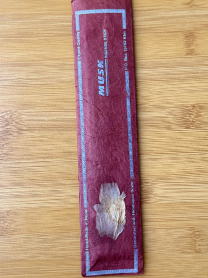 Handmade incense stick pack in Musk, wrapped in eco-friendly lokta paper, 100% natural and made in Nepal, part of the Sacred Scents & Space collection by Suzy’s Treasures.
