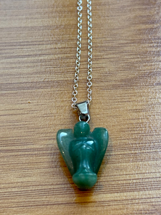 Green Aventurine pendant in angel shape with sterling silver chain on wooden background – Suzys Treasures