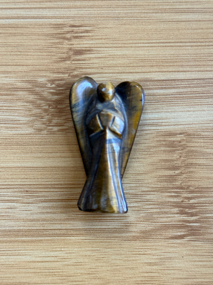 Tiger's Eye angel crystal carving on a wooden background – Suzy's Treasures

