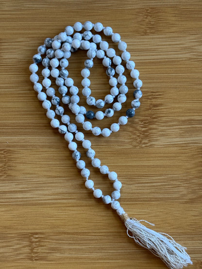 108-bead Howlite mala necklace with 6mm white marbled beads and white tassel, used for calming and clarity – from Suzys Treasures.