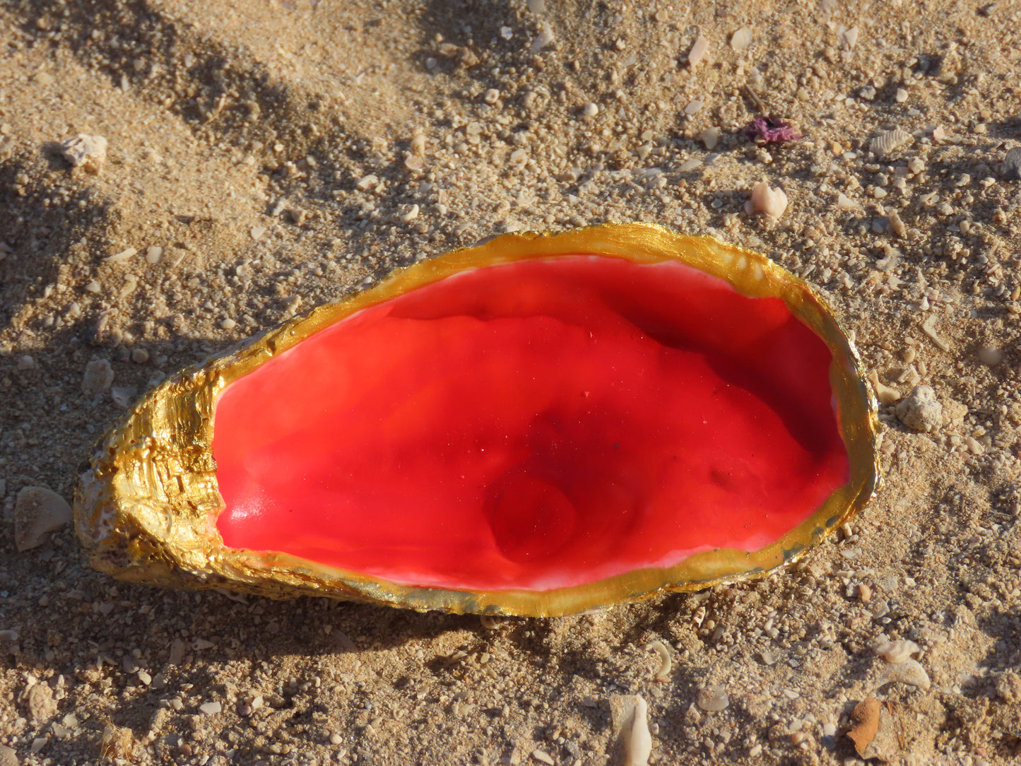 Hand-painted red oyster shell dish with gold trim – unique home decor or jewelry holder from Ocean Treasures by Suzys Treasures Dubai